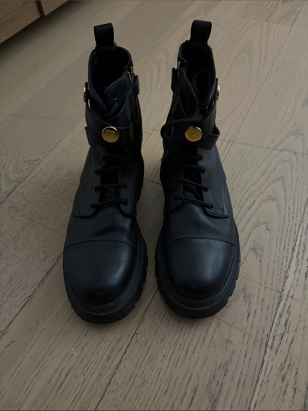 Balmain Black Leather Lace-Up Boots with Gold Medallion